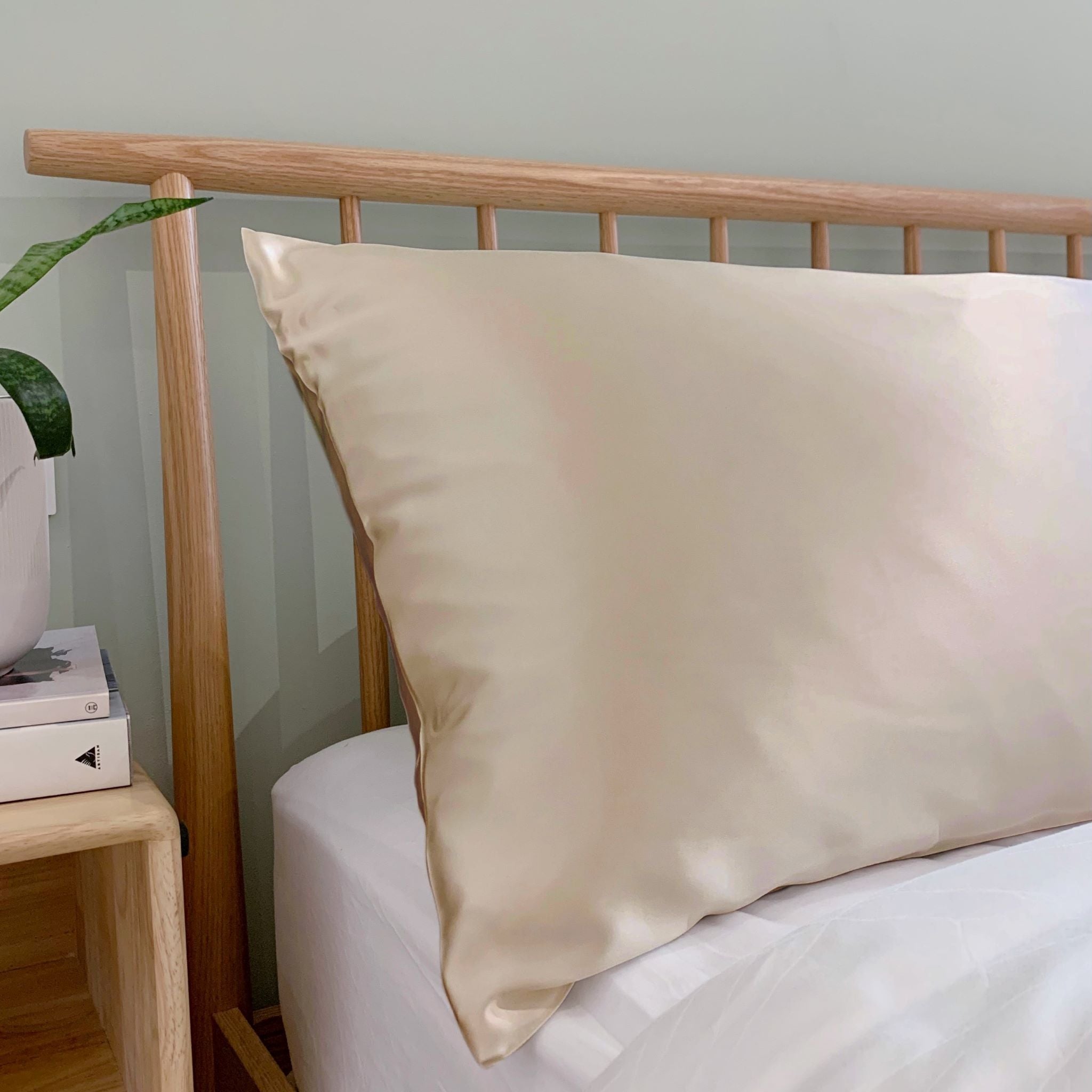 Pure Mulberry Silk Pillowcase in Champagne Gold on Bed